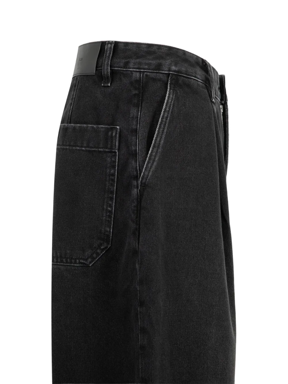 Studio Nicholson Jeans met wijde pijpen en enkele plooi Zwart