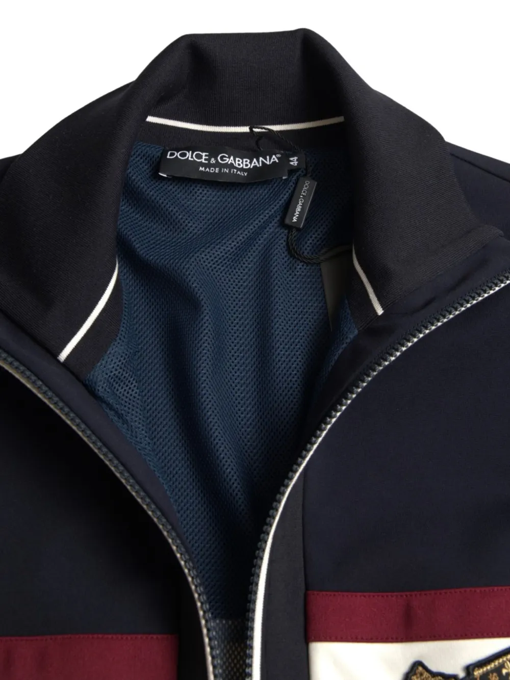 Dolce & Gabbana Gestreepte trui met geborduurd wapenschild Blauw