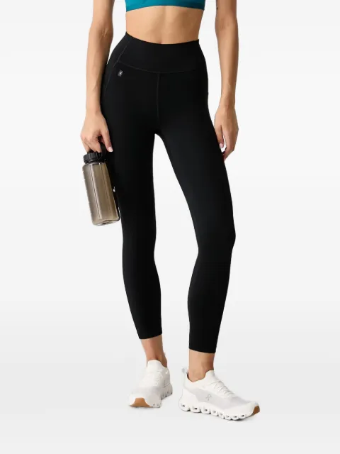 On  leggins con parche del logo