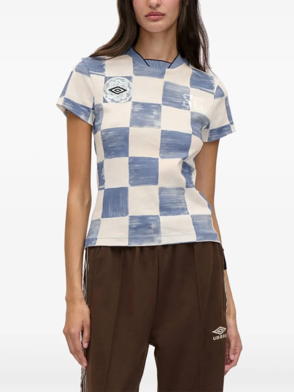 Stine Goya x Umbro biologisch katoenen T-shirt met ruit-print en logo-patch Beige
