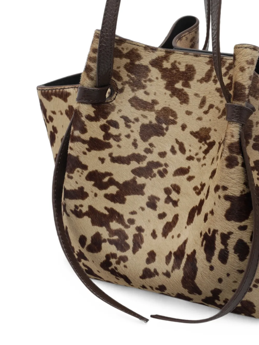 Yuzefi Mochi schoudertas met koeienprint Beige