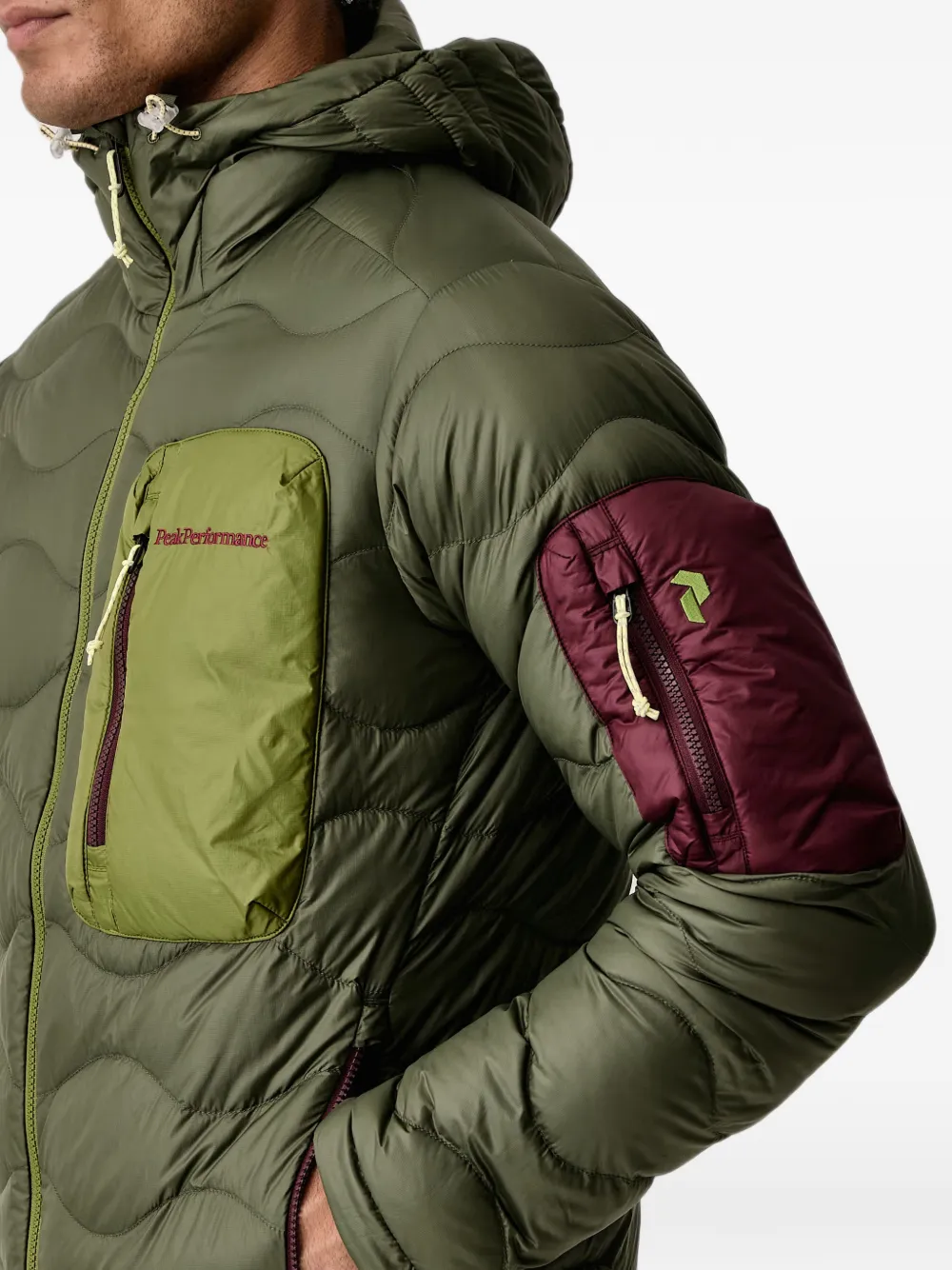 Peak Performance Helium Utility gewatteerd jack met capuchon Groen