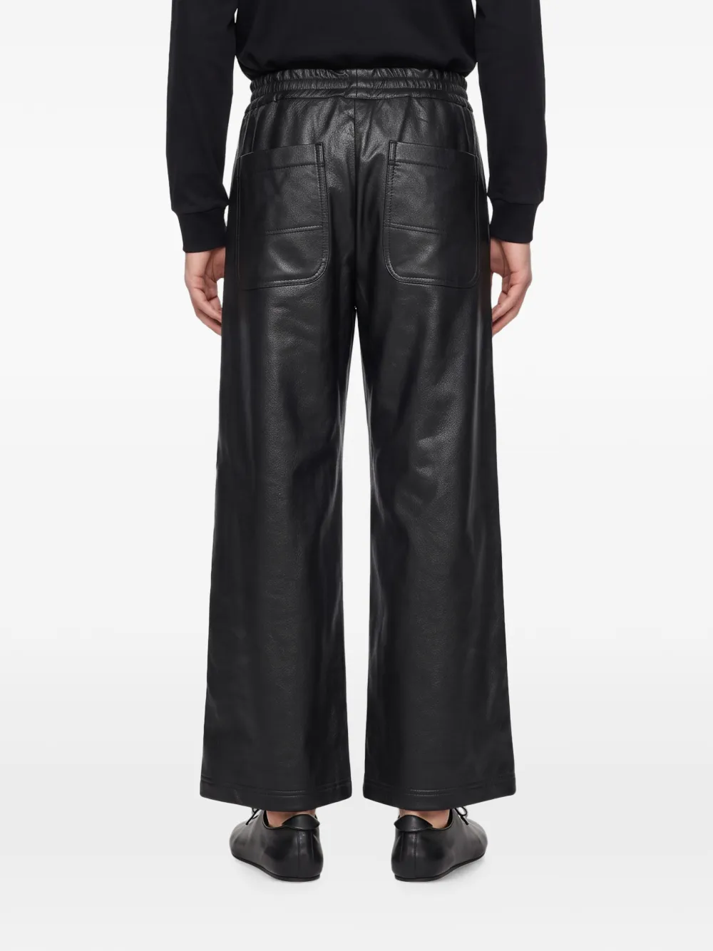 Comme des Garçons Homme Plus Broek met wijde pijpen en geperforeerde details Zwart