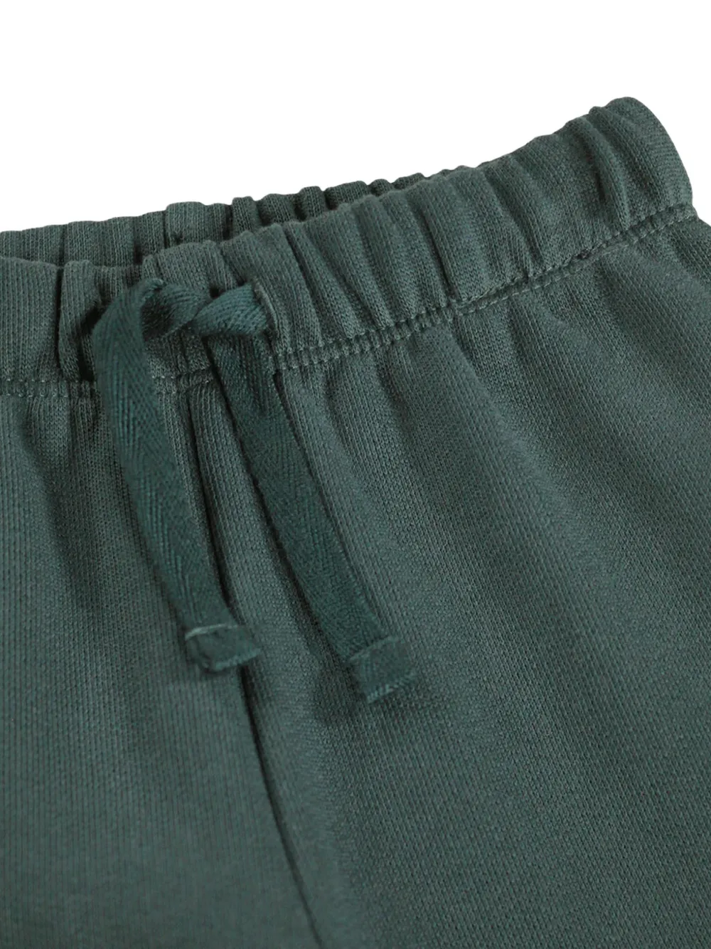 Molo Simeon trainingsbroek met dassen-patch Groen