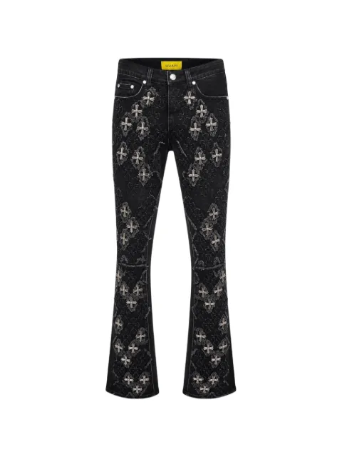 GUAPI Relic distressed flared jeans