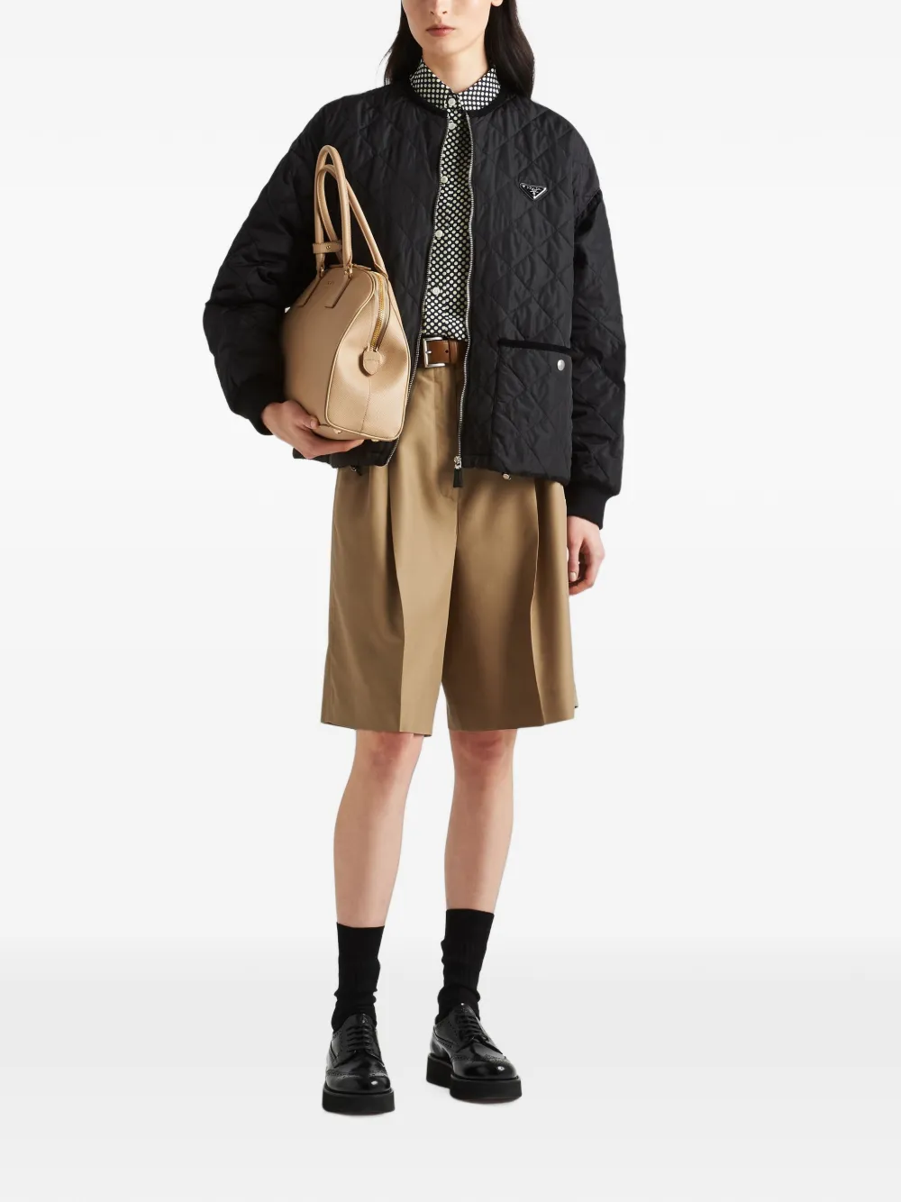 Prada Re-Nylon gewatteerd jack Zwart
