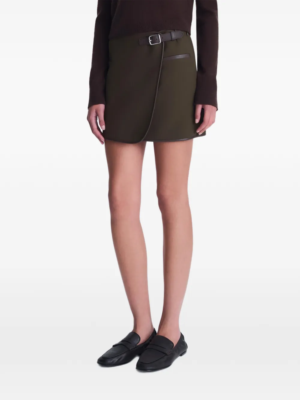 SIMKHAI asymmetric buckled mini skirt Groen