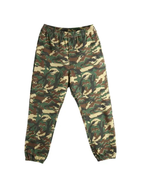 A BATHING APE® camouflage-print track pants