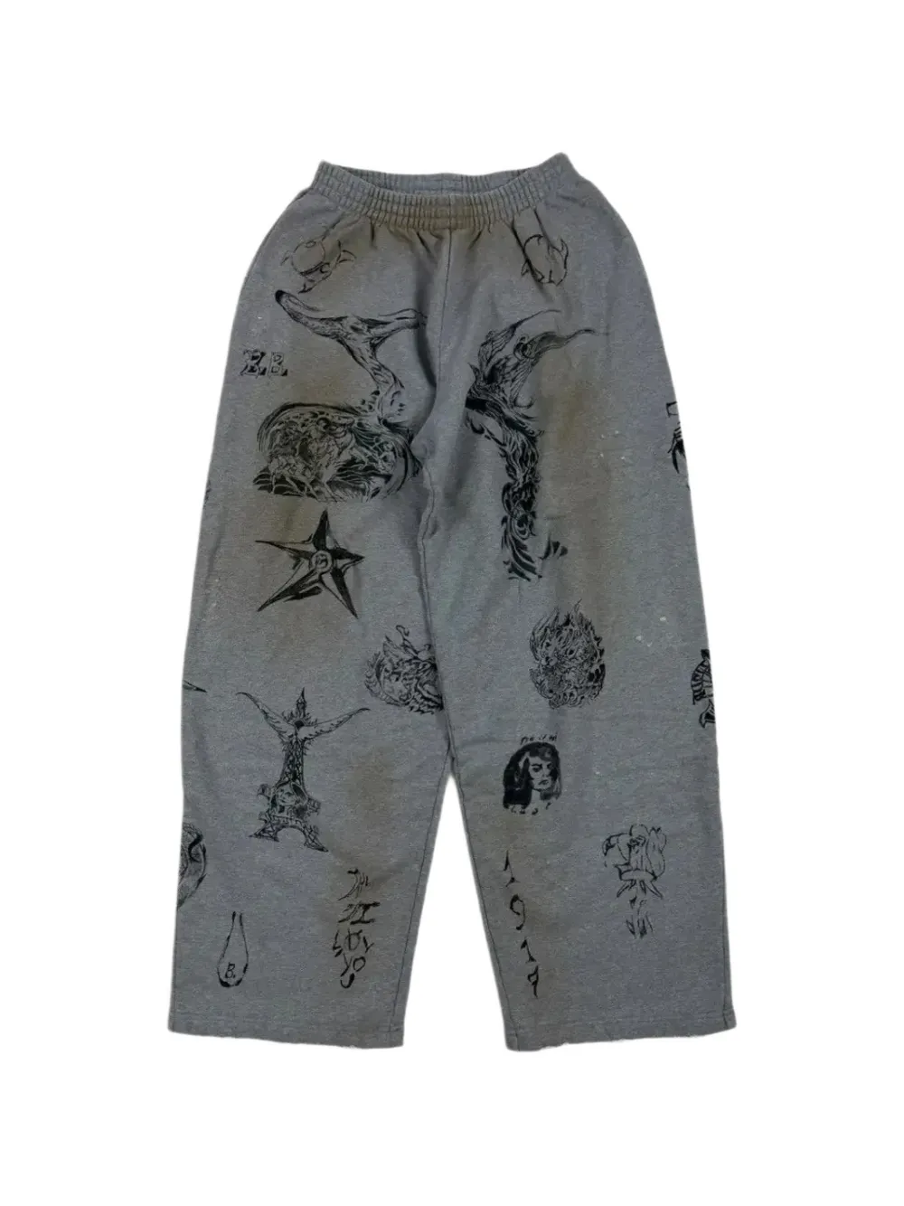 Balenciaga tattoo-graphic distressed track pants - Grigio