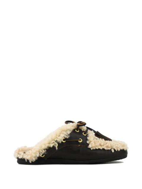 TORAL SHOES mules Killian con borlas y ribete de lana