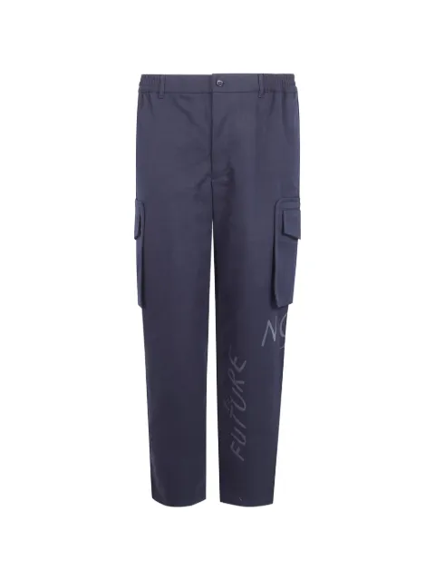 Comme Des Garçons Shirt Calça cargo com estampa de slogan