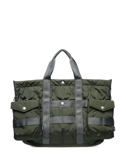 Comme des Garçons Homme tote capitonada con múltiples bolsillos