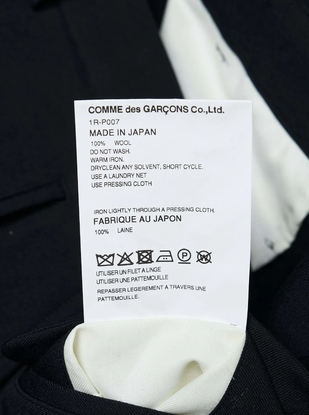 Black Comme Des Garçons curved-panel wool trousers Zwart