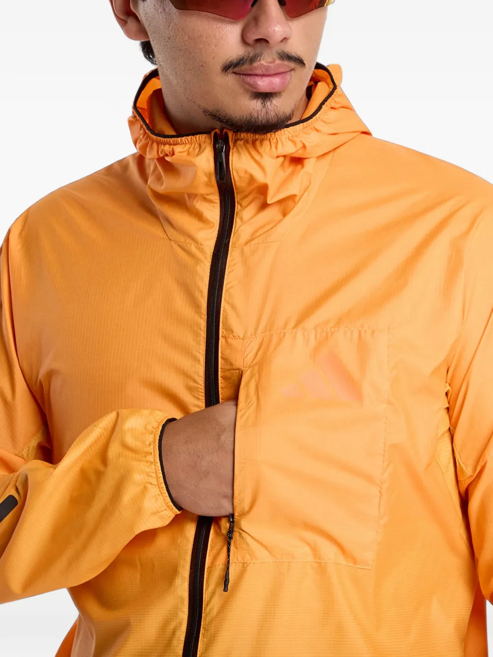 adidas Terrex Xperior Windweave jack met logo-print Oranje