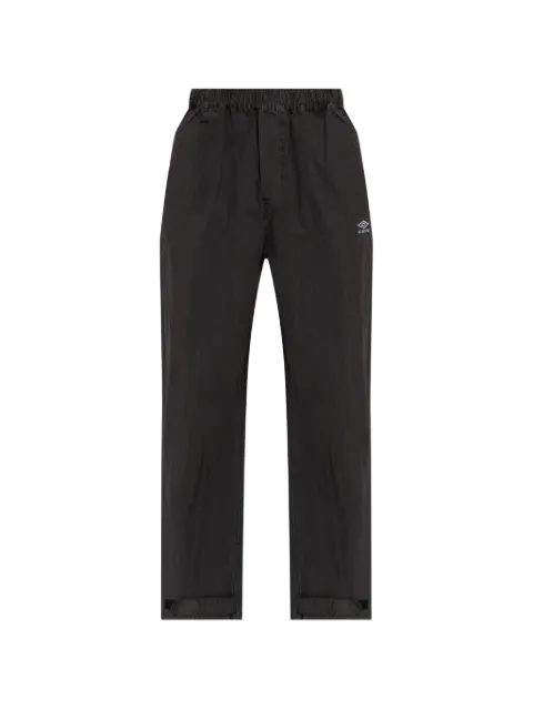 UMBRO logo-embroidered touch-strap trousers
