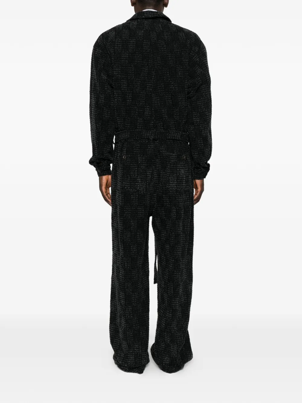 Individual Sentiments Jumpsuit met afwerking met textuur en ceintuur Zwart