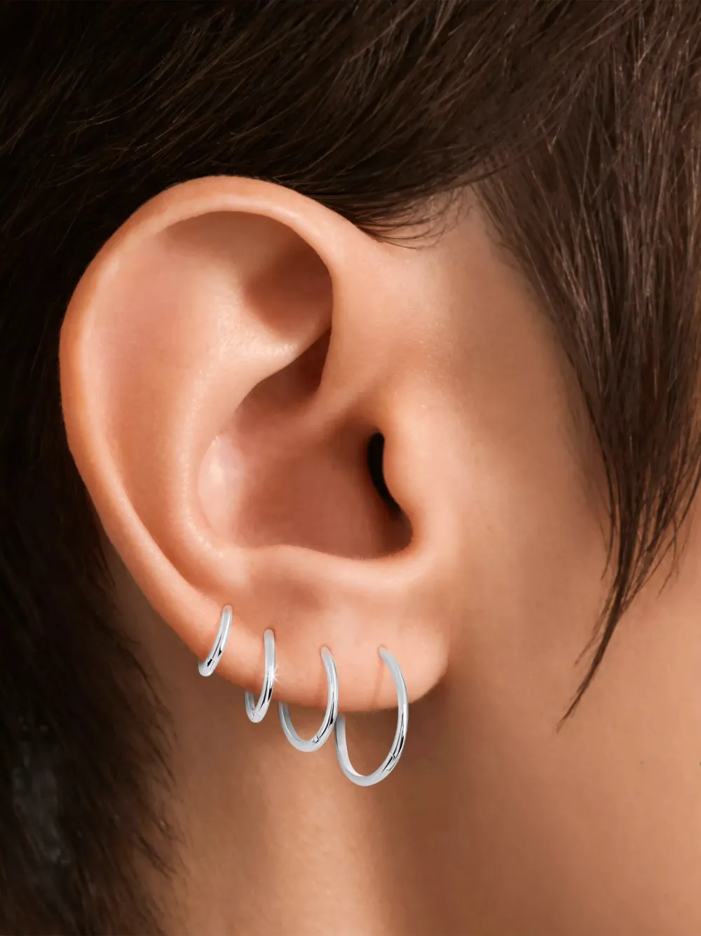 SABOTEUR round-profile single hoop earring - Oro