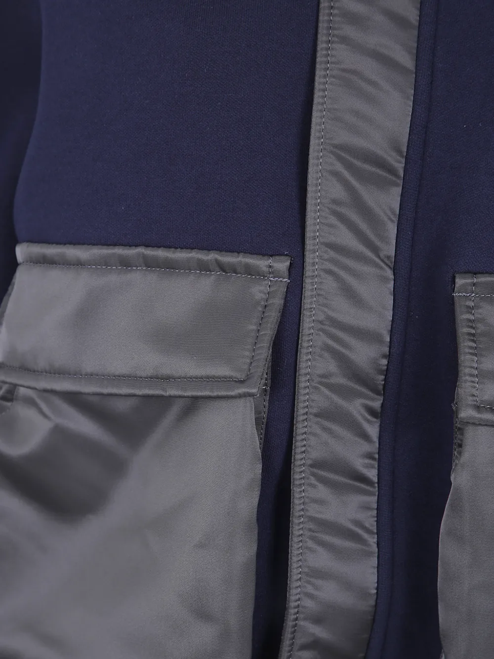 sacai Jack met klepzak en vlakken Blauw