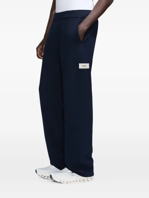 FLÂNEUR pants Atelier con parche del logo