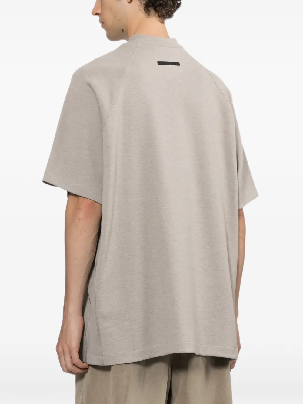 FEAR OF GOD ESSENTIALS T-shirt met halve rits en raglanmouwen Beige