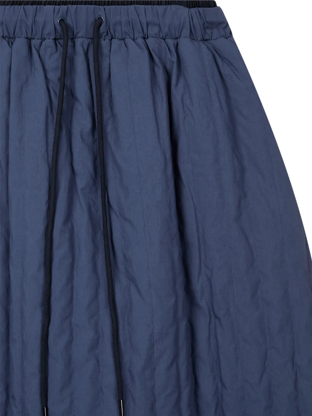 TOMBOY quilted A-line midi skirt Blauw