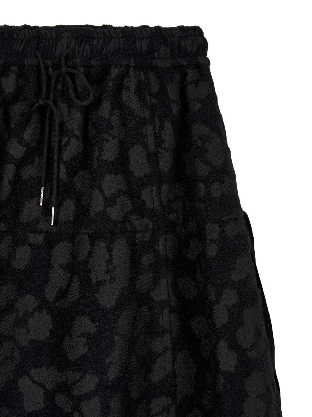 TOMBOY patterned A-line midi skirt Zwart