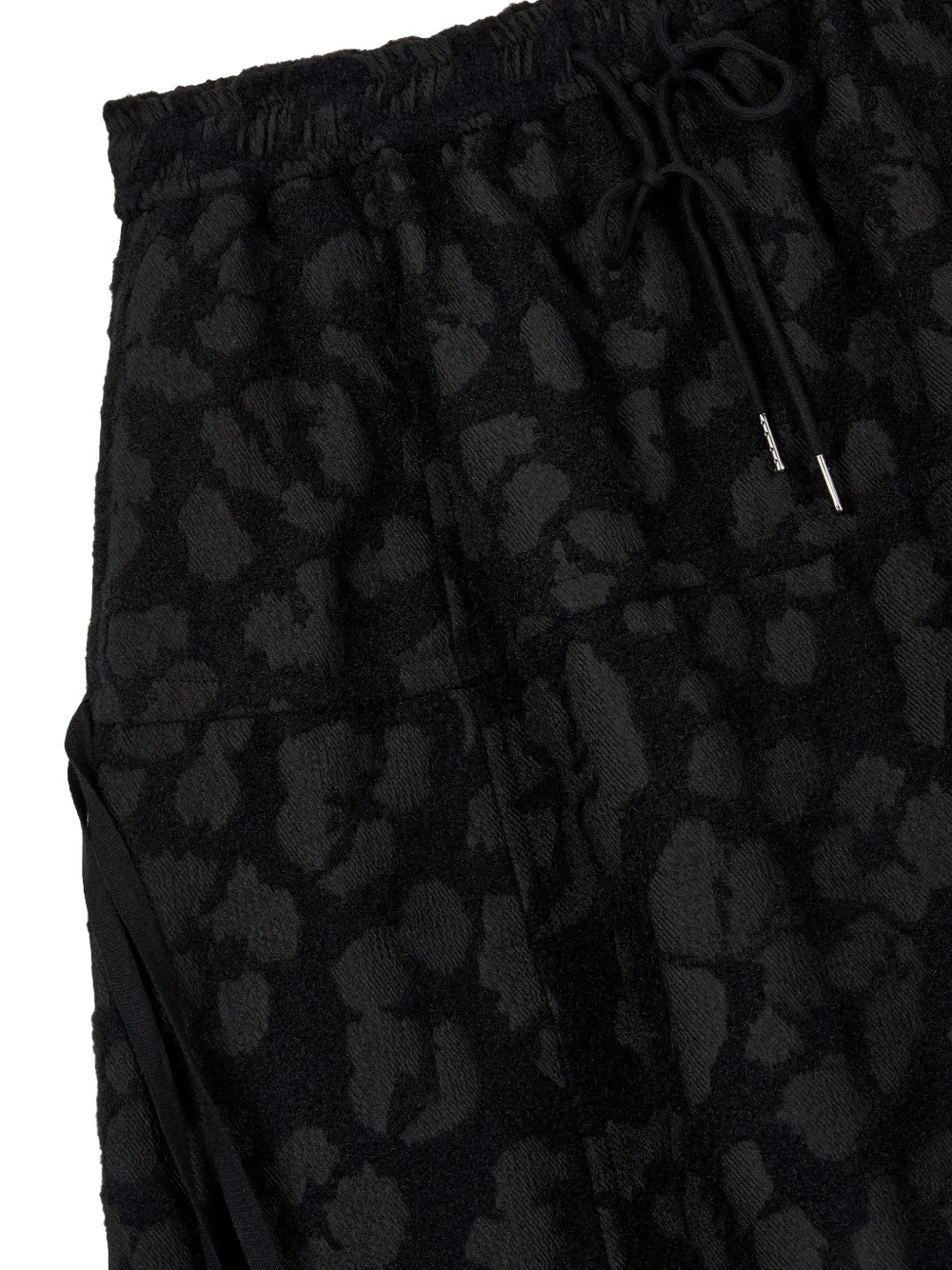 TOMBOY patterned A-line midi skirt Zwart