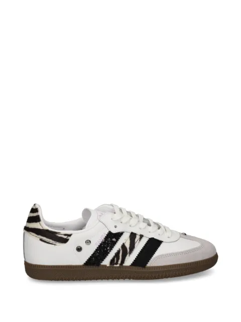 SEDDYS zebra-print studded sneakers