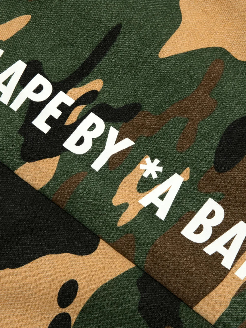 AAPE BY *A BATHING APE Trainingsbroek met camouflage- en logoprint Groen