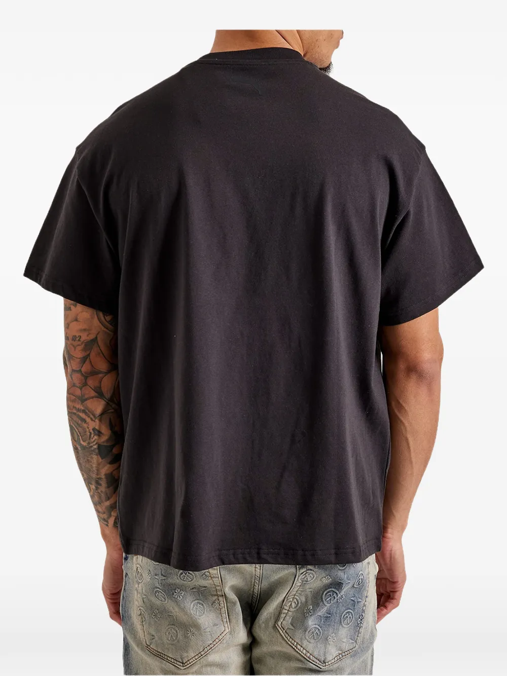 PUMA Melo Phoenix T-shirt Zwart
