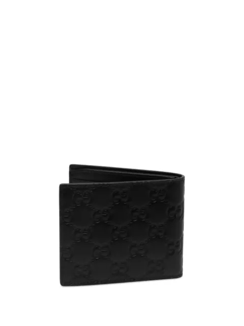 Gucci Pre-Owned cartera plegable pequeña de piel de becerro con emblema GG en relieve 2016-2026