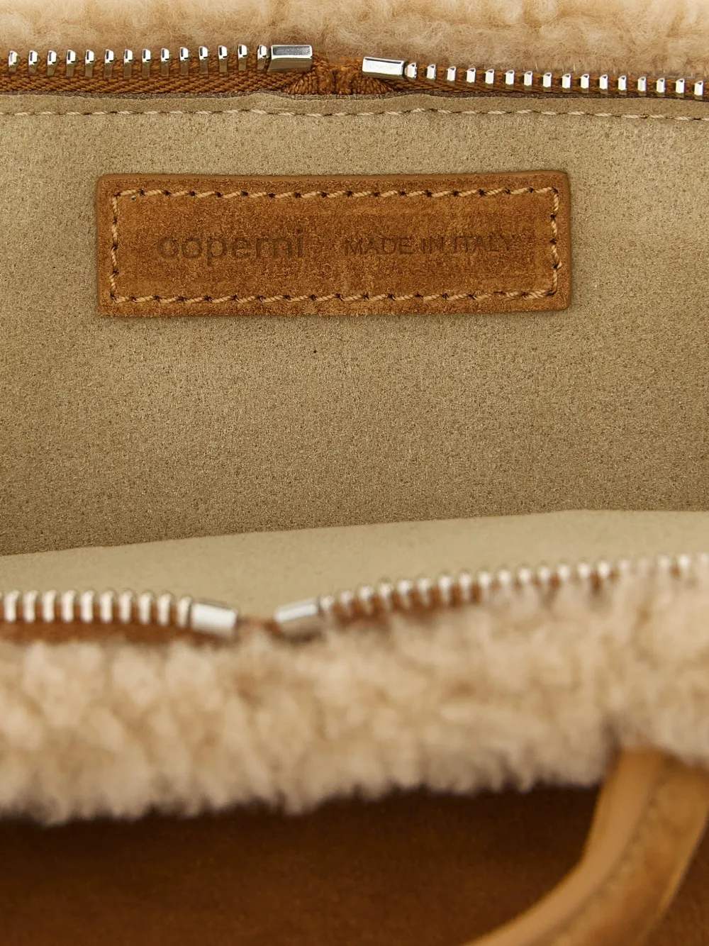Coperni Duffle heuptas met lammy afwerking Bruin