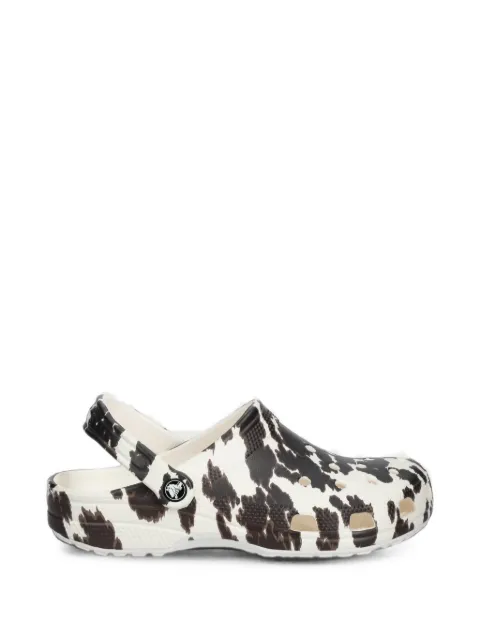 Crocs cow-print slides