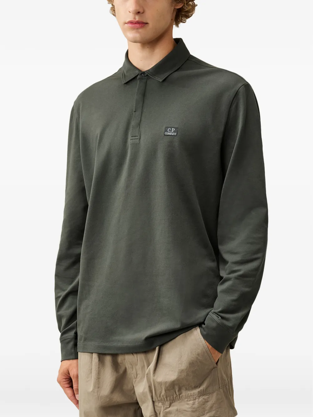 C.P. Company Stretch-piquet poloshirt met lange mouwen en één knoop Groen