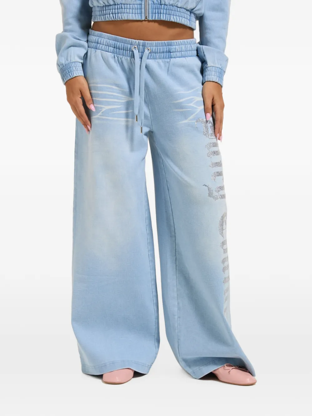 Juicy Couture pantalon de jogging ample à logo ornemental - Bleu Juicy Couture pantalon de jogging ample à logo ornemental - Bleu