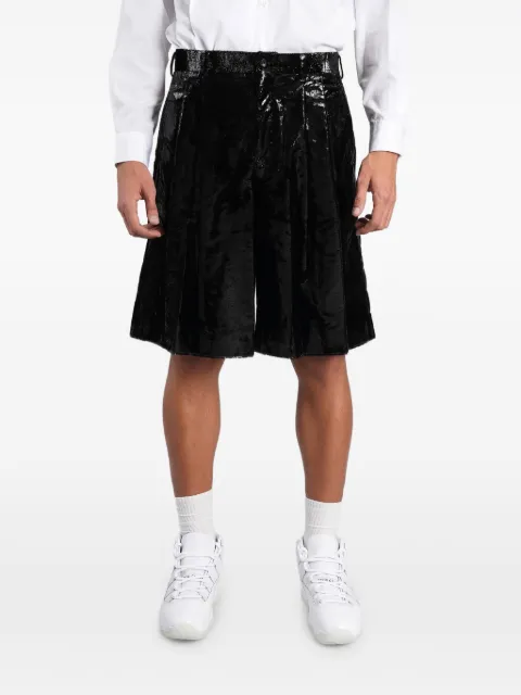 Comme des Garçons Homme Plus Shorts plissettati con finitura rivestita