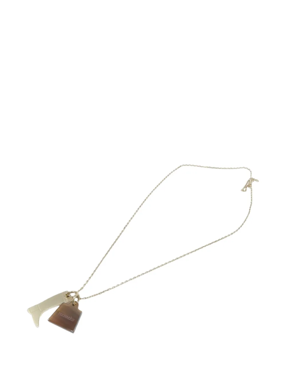 Hermès Pre-Owned collier Amulette Maroquinier en corne et métal - Argent Hermès Pre-Owned collier Amulette Maroquinier en corne et métal - Argent