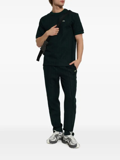 Lacoste pants con monograma
