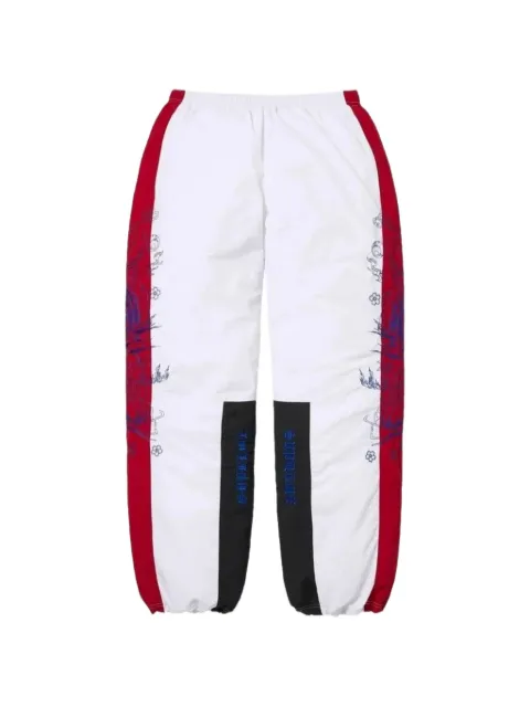 Supreme AOI embroidered track pants