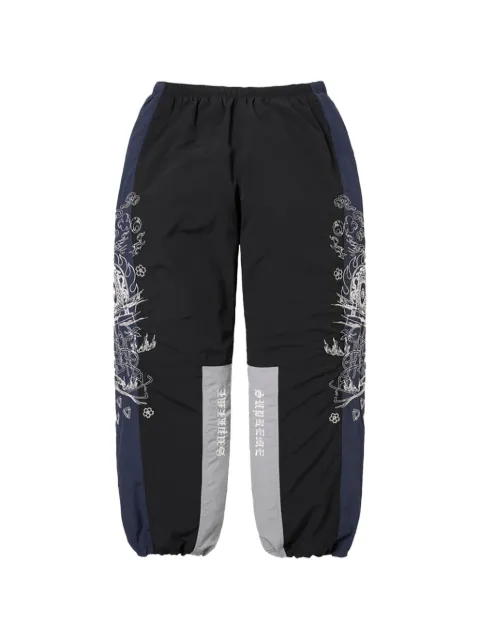 Supreme Pantaloni sportivi AOI con stampa grafica
