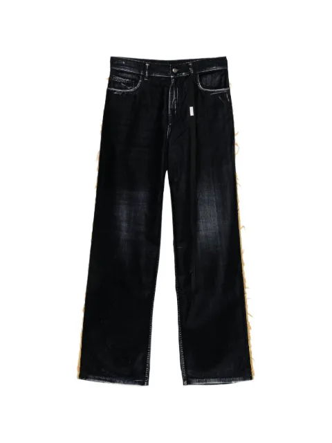 Ann Demeulemeester jeans con ribete de flecos