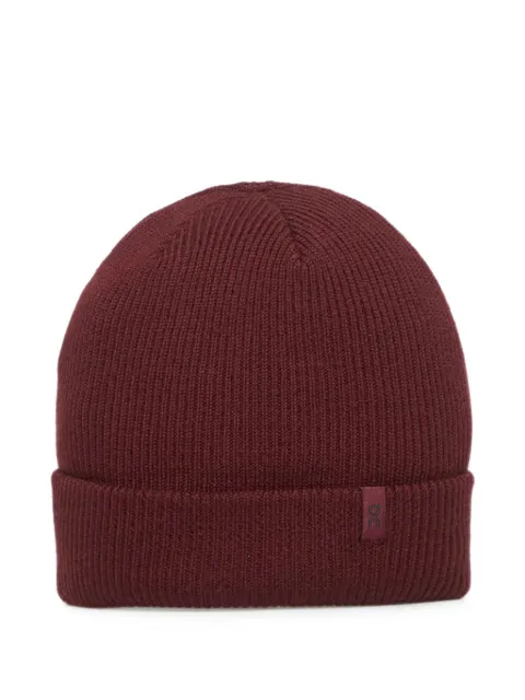 On  ribbed-knit wool beanie hat