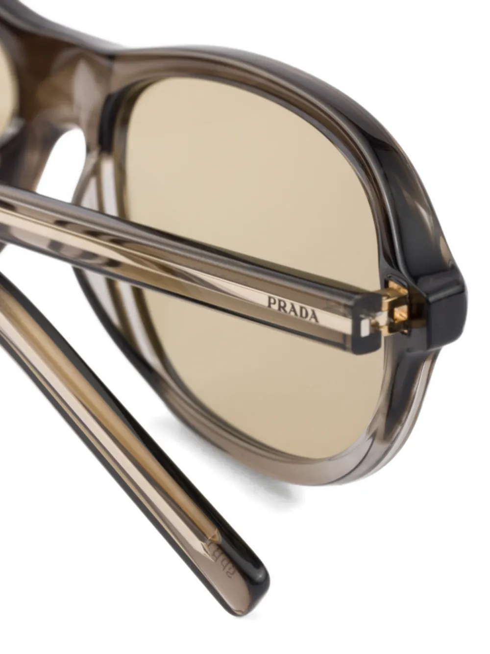 Prada Eyewear Zonnebril met iconisch metalen plakkaat Grijs