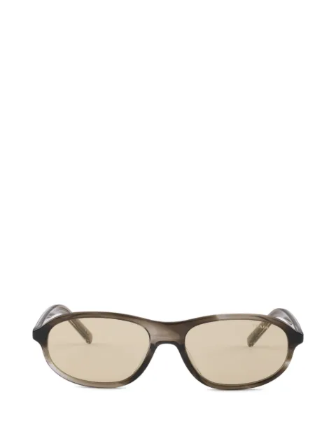 Prada sunglasses with the iconic metal plaque