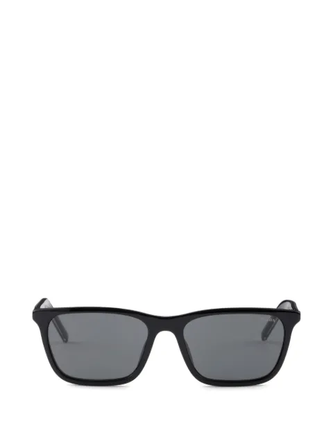 Prada sunglasses with the iconic metal plaque