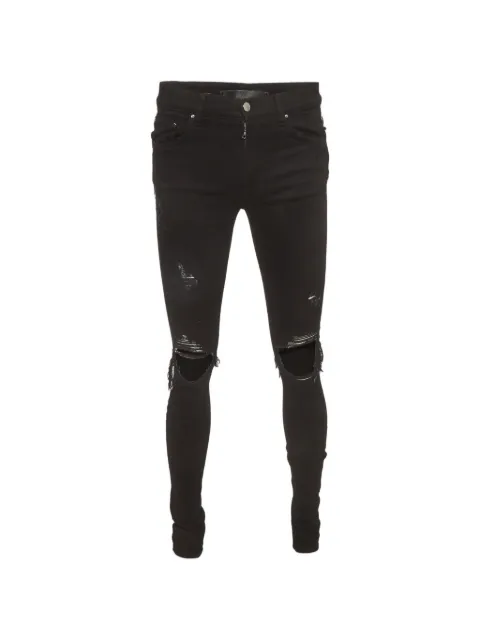 AMIRI striped distressed jeans