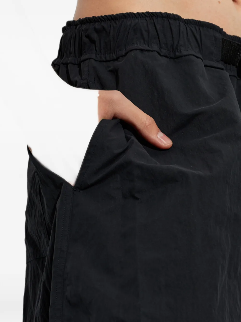 Studio Nicholson Caro broek met ceintuur Zwart