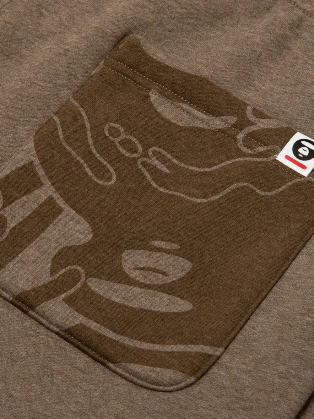 AAPE BY *A BATHING APE Trainingsbroek met logoprint Bruin