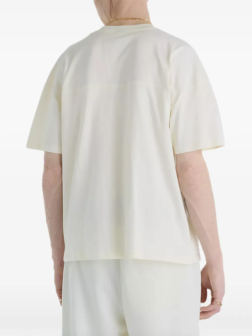 New Balance Legacy sport T-shirt met grafische print Beige