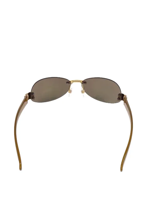 CHANEL Pre-Owned rimless oval-frame sunglasses